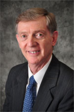 James E. Dewar, Q.C.,